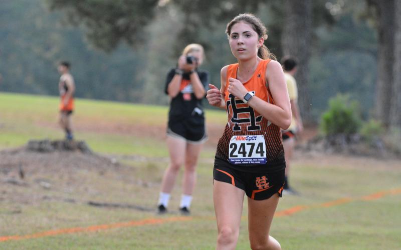 Melody Bloomberg eyes the finish line in Hart's home meet Sep. 30.