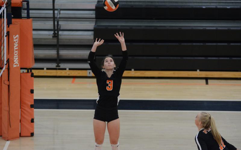 Drew Dotson/ The Hartwell Sun - Senior Aliza Hart sets the ball in her last home game on Tuesday, Oct. 19.