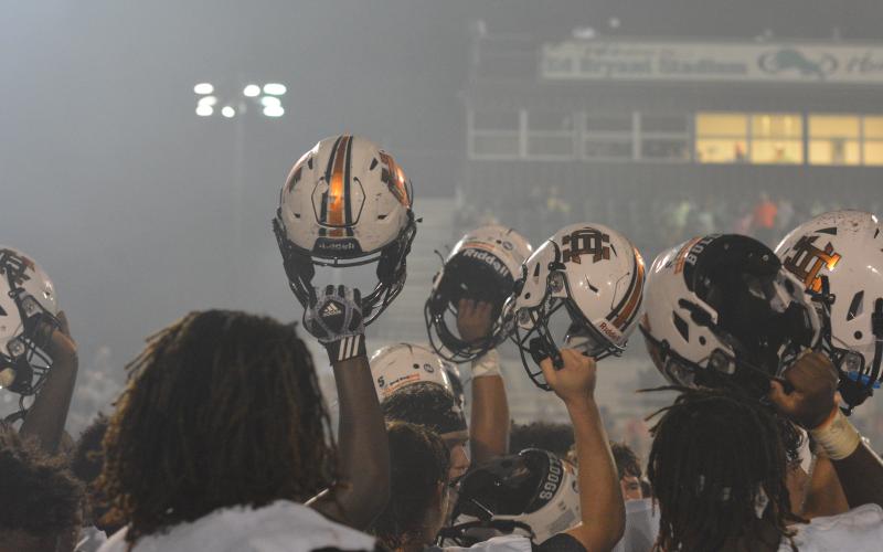 Hart County players celebrate after a dominating 37-0 road win over rival Franklin County on Oct. 1.