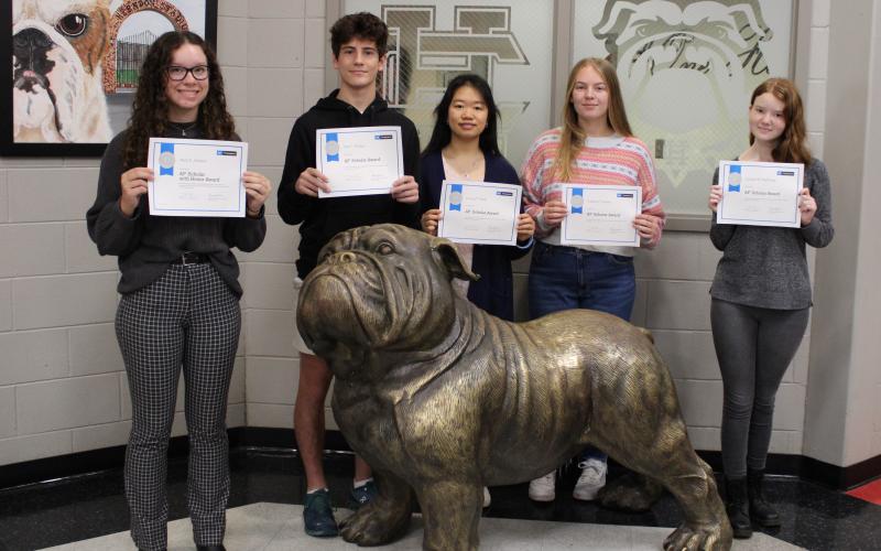 AP Scholar students (from left to right) Mary Elizabeth Jackson, Tate Phillips, Huong Pham, Cassidy Gaines, and Lindsey Waldvogle pose with their certificates.