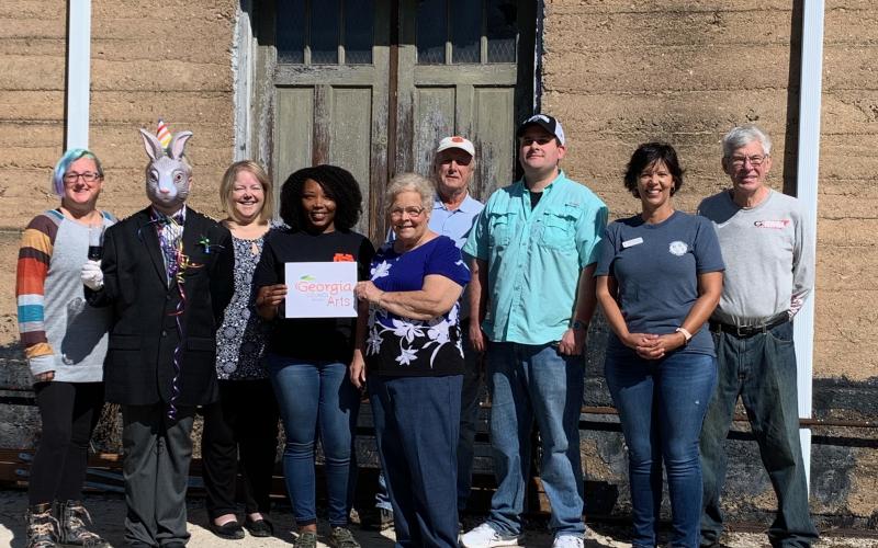 Pictured left to right are HCCT and TORCH board members Lani Sessoms, Morgan Haymes (Harvey), Kerri Prutt, Ayoca Freeman,  Mary Gidley, Christopher Milford, Lenford Smith, Kristin Joyner and Larry Torrence.