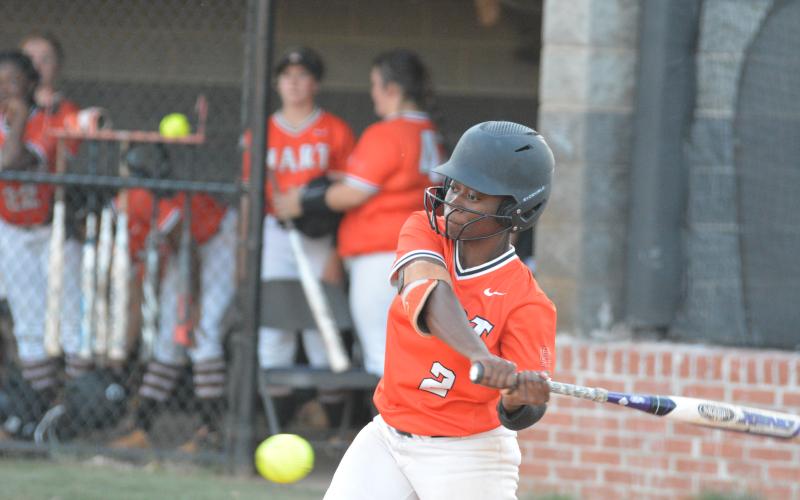Taikibrea “Red” Campbell swings for a pitch in the last home regular-season game.