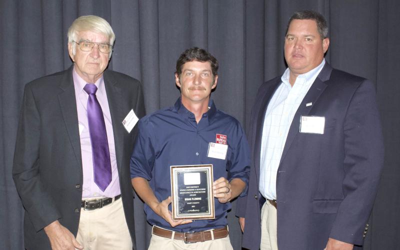 Fleming receives his award in September.