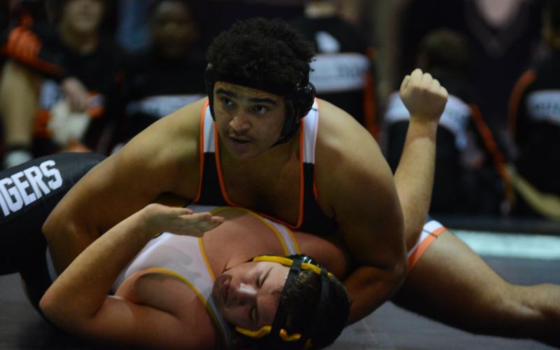 Quanterrio Hyman looks to referee for the pin against his Crescent opponent on Wednesday, Dec. 15.