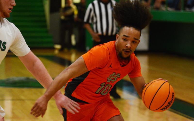 Sean Teasley uses speed to out-maneuver the physical defense.