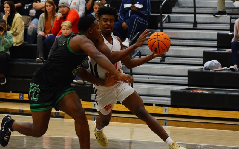 Tahj Johnson drives through the Franklin County defense.
