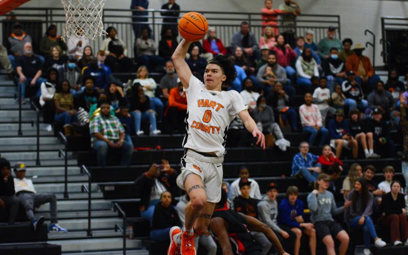 Johnny Curry slams down a dunk in the team’s 63-49 win over Stephens County on Friday, Feb. 4.
