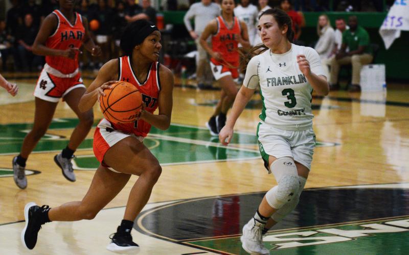 Drew Dotson/ The Hartwell Sun Valasha Carter drives to the basket against Franklin County on the road.