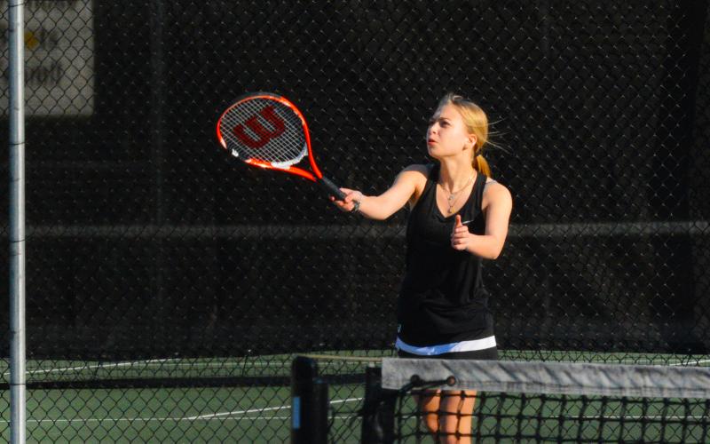 Drew Dotson/ The Hartwell Sun - Hannah Harris serves it up in her and Ryleigh Jordan’s doubles win over Clarke Central.