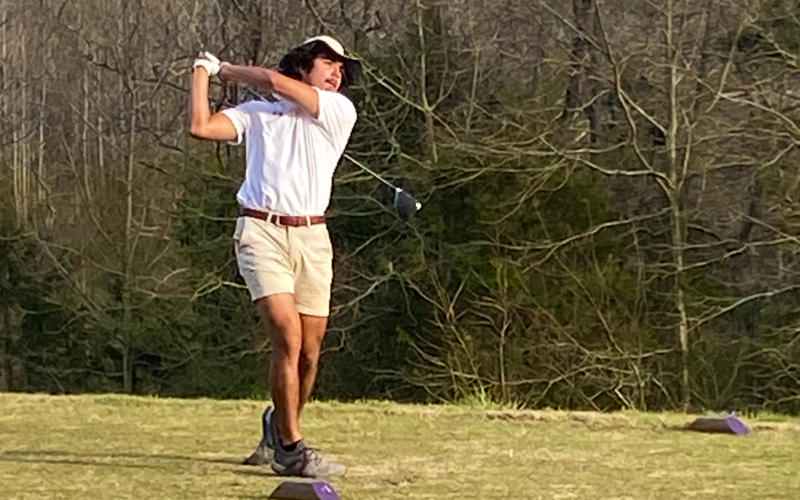 Payne Oglesby tees off on hole three against White County.