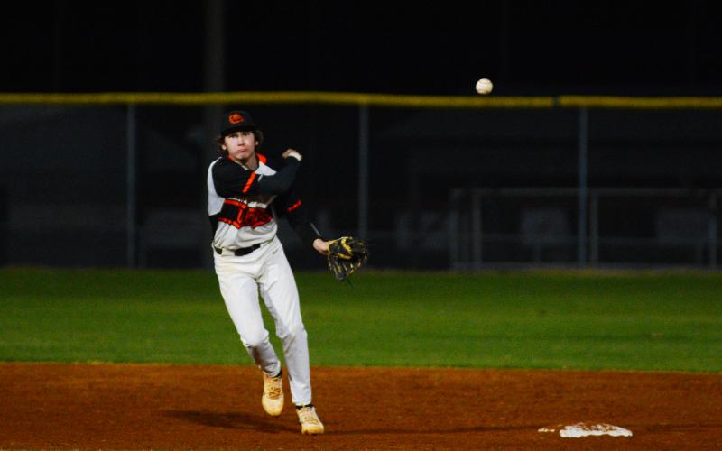 Zach Dombrowsky throws a runner out in the win over Banks County on March 1.