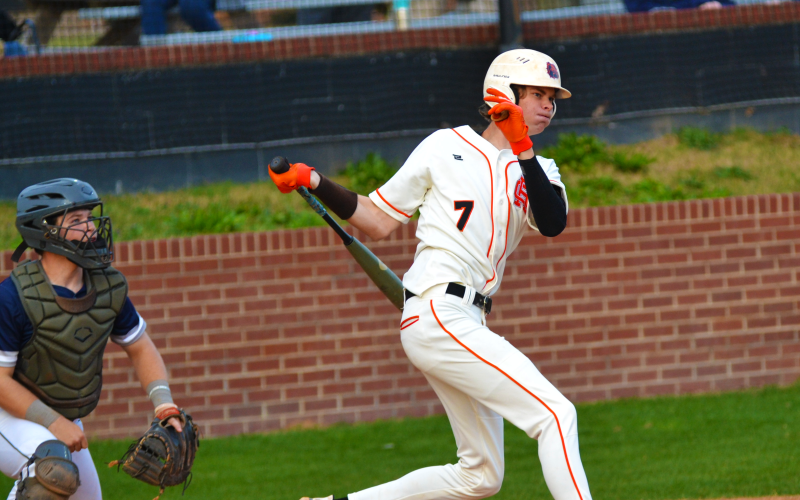 Tanner Ayers gets a hit in the home win against East Jackson on March 22.