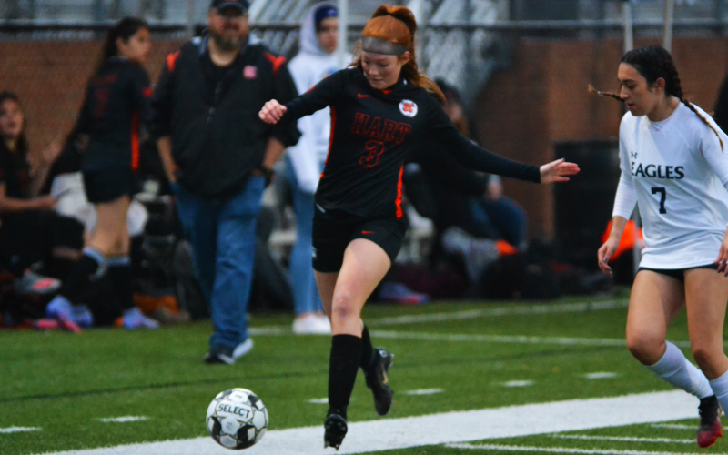 Channing Segars takes the ball down the sideline in a home match earlier this season against East Jackson.