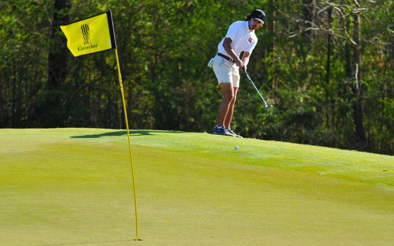 Payne Oglesby makes his approach in the match against Oconee County on March 24.