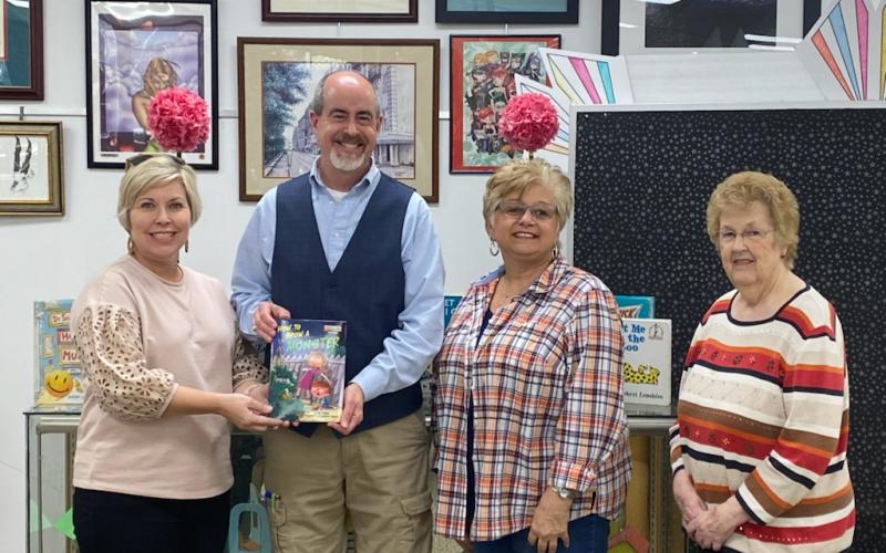 Pictured is Angie Brown, Hart EMC Director of Public Relations, Richard Sanders, (center) Director of Hart County Library, Tina Simmons and Linda Haley, (right) Hart County Farm Bureau.