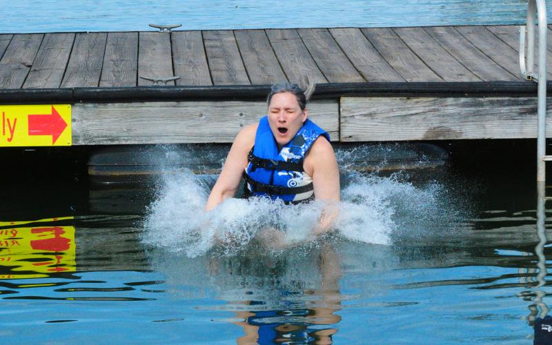 Jodi Simmons braves the chilly Lake Hartwell water for the first time on Saturday.