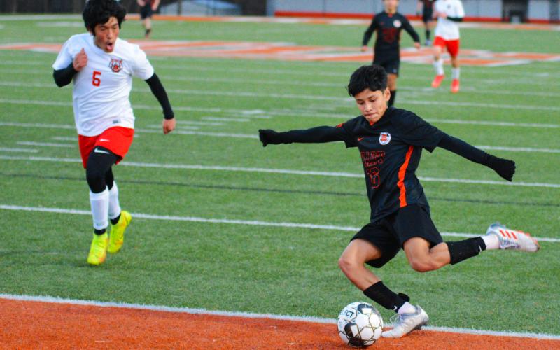 Luis Genchi crosses the ball in the team’s last game at home against Rabun County.
