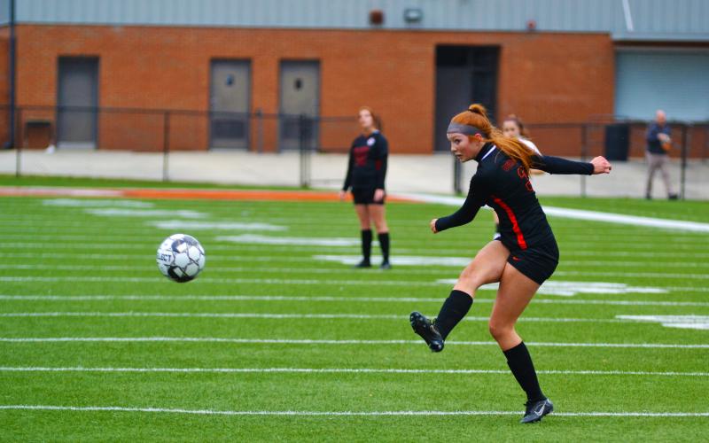 Channing Segars scores the first of three goals against Crescent on March 15.