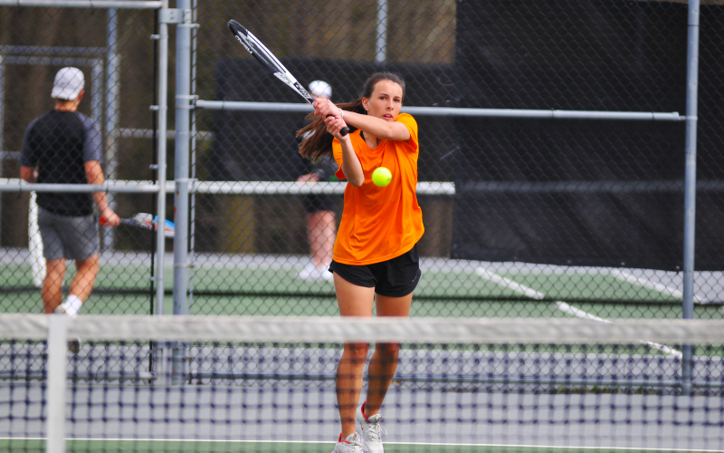 Ryleigh Jordan return a shot in her win against Monroe Area.