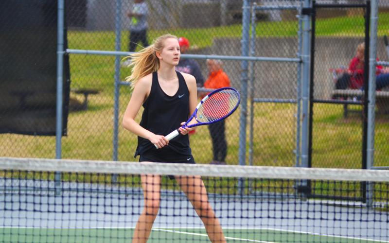 Ava Carnes awaits the return in her match against Stephens County on March 15.