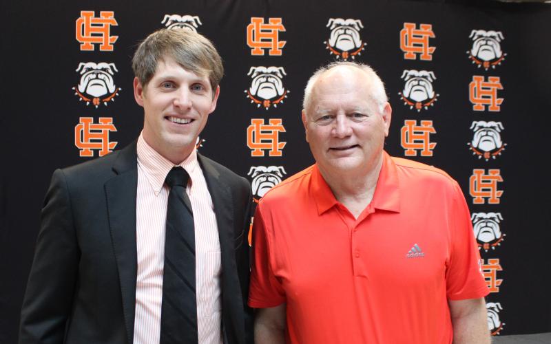 Photo submitted New Hart County basketball coach Matt Gibbs alongside Hart County basketball coaching legend Harry Marsh, who announced his retirement last week.