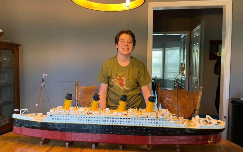 Ford proudly shows off his pieced together model of the RMS Titanic.