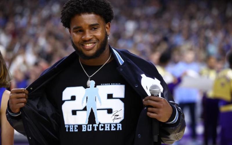 Rucker flashes his brand after the performance Saturday.