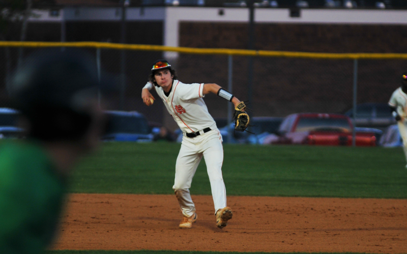 Zach Dombrosky attempts to throw a Franklin County runner out at first.