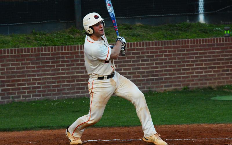 Riley Posey prepares to run after making contact on Friday against Oconee County.