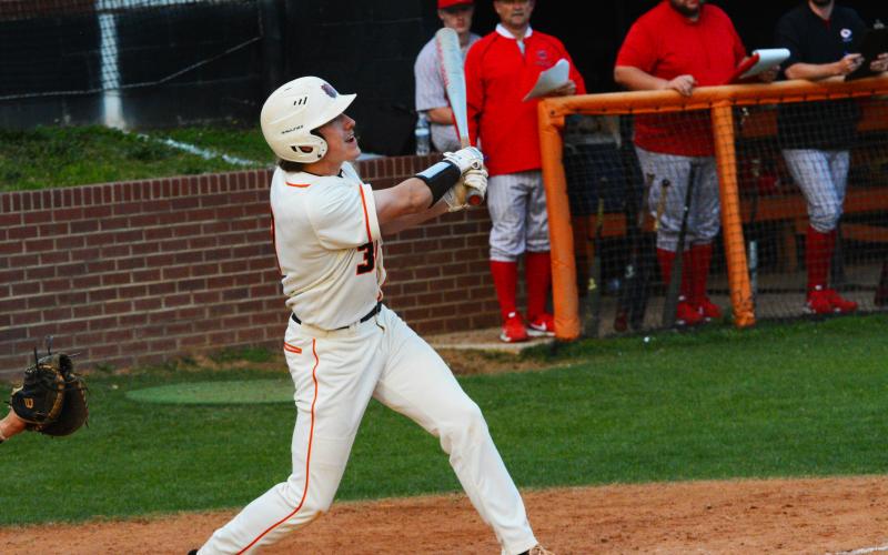 Jake Dombrowsky gets a hit in the first series game against Stephens County on April 12.