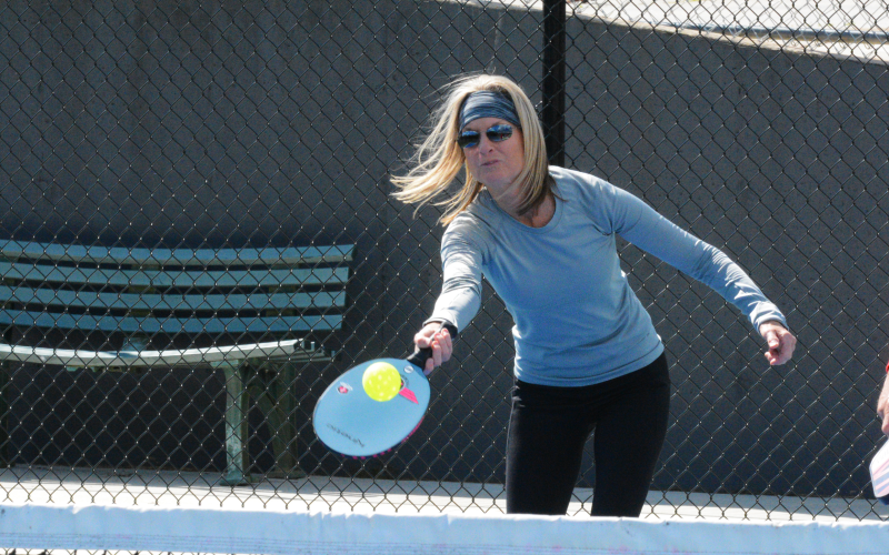 Drew Dotson/ The Hartwell Sun - Tammy Pitt reaches for the ball in her mixed doubles match.