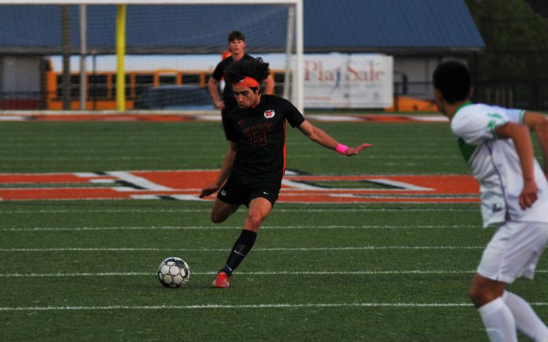 Tyler Trujillo scores a goal on a free kick earlier this season.
