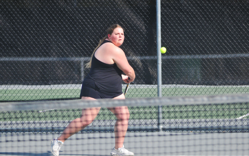 Senior Abigail Martin prepares for the backhand against her Washington Wilkes opponent on April 30.
