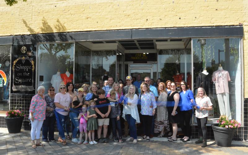Hart County Chamber of Commerce members and other business leaders meet at BW Threads for its ribbon cutting April 28.