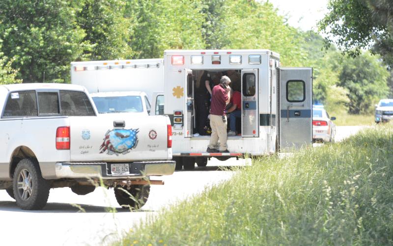 Traffic was blocked Tuesday afternoon near the intersection of Redwine Church Road and Airline-Goldmine Road as law enforcement investigated an apparent double homicide and Hart County EMS tended to a victim who died within minutes of first responders’ arrival.