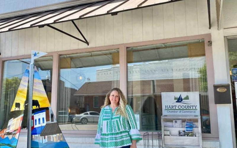 New Hart County Chamber director Lindsey Ingle stands outside the Chamber building along Carolina Street.