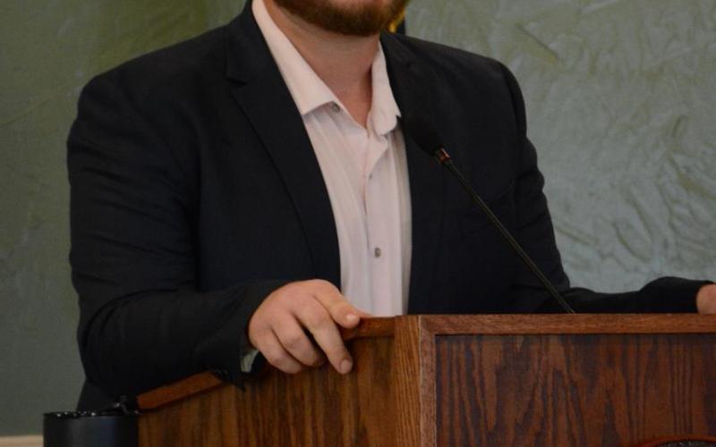 Challenger Dylan Purcell speak to an audience at Franklin Springs City Hall.