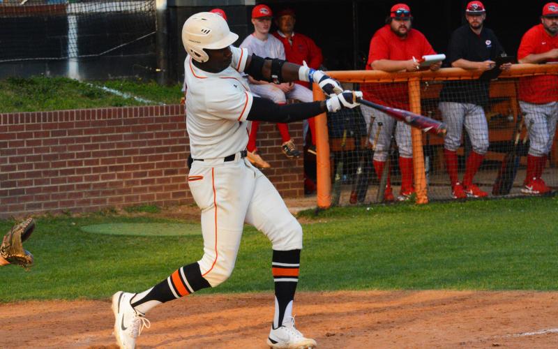 Paul Davis makes contact in a game earlier this season.