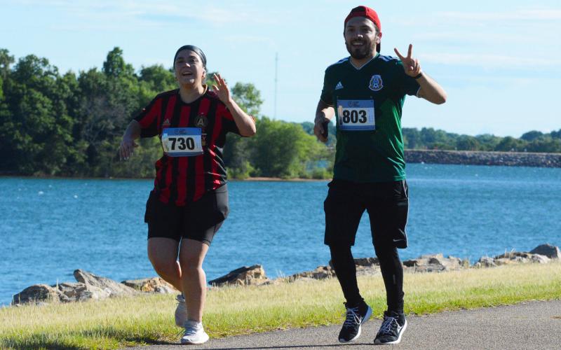 Miranda Medina, left, and Roque Sanchez traveled from Athens for the Dam Run.