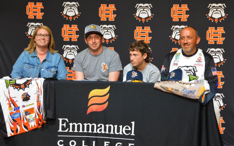 Dawson Carden signs to Emmanuel College for fishing.