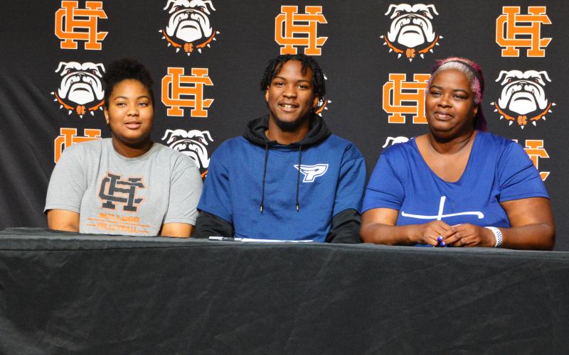 J.L. Lackey signs to Pointe University for football.