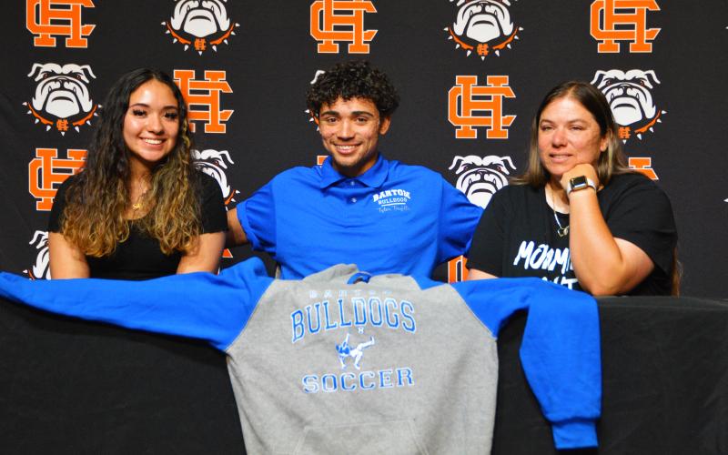 Tyler Trujillo signs to Barton College for soccer and e-sports.