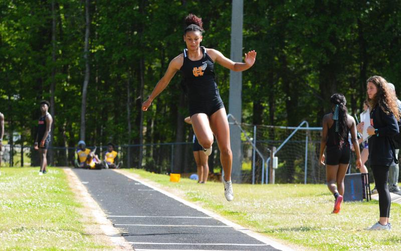 Alexis Walker skips during the triple jump at Hart’s home meet on April 21.