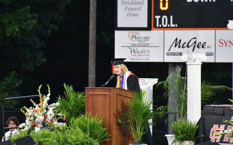 Valedictorian Ethan McDowell addresses his class. McDowell was the last student to speak before the presentation of diplomas. McDowell will be attending Brown University this fall.