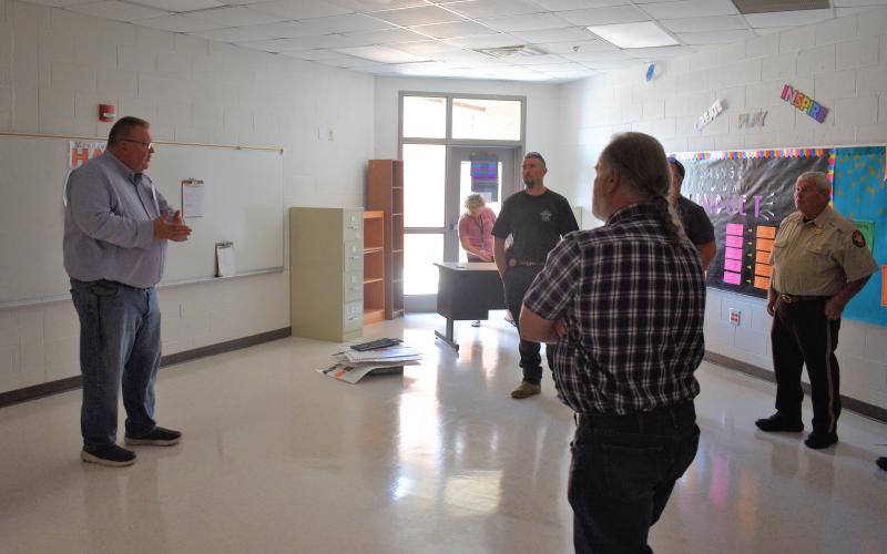 Hart County superintendent Jay Floyd addresses a group of local leaders and law enforcement in a classroom at South Hart Elementary School. Floyd was giving a rundown on the charter system’s security processes and technologies.