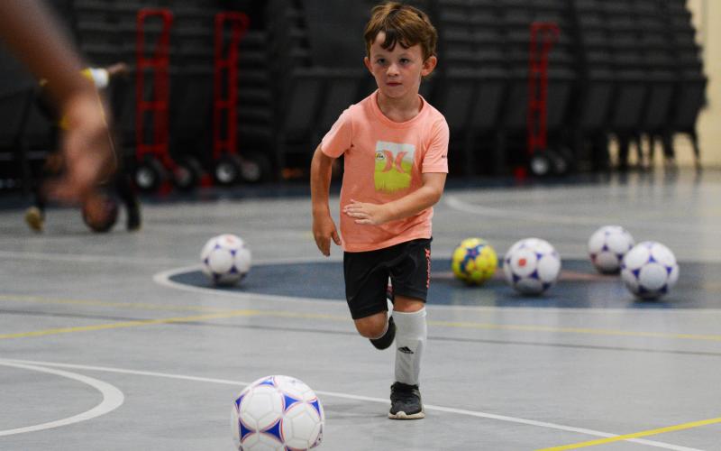 Carson Cox showed off his dribbling ability in the YMCA gym.