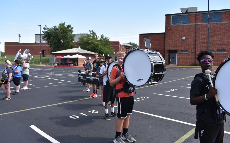 The Hart County drumline prepares to serve as the heartbeat of the Bulldog nation for another season under the lights of Herndon Stadium.