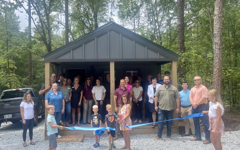 Hartwell Chamber members and other local leaders met earlier this month for a ribbon cutting at Hartwell Cabins &amp; RVa, located at 700 Parkdale Drive in Hartwell.