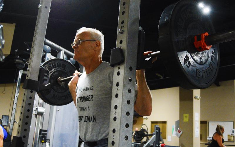 David Leard shows off his squat technique that allowed him to set a state record.