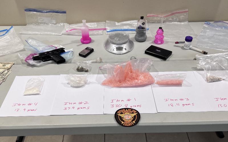 The items seized by investigators during the Aug. 18 investigation included approximately 18 ounces of meth, cash, firearms and drug paraphernalia.